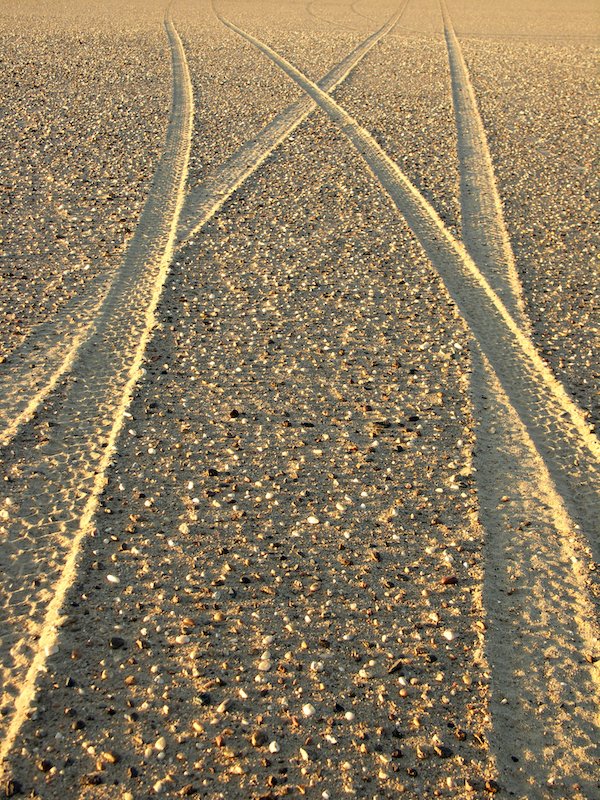 sporen in het zand